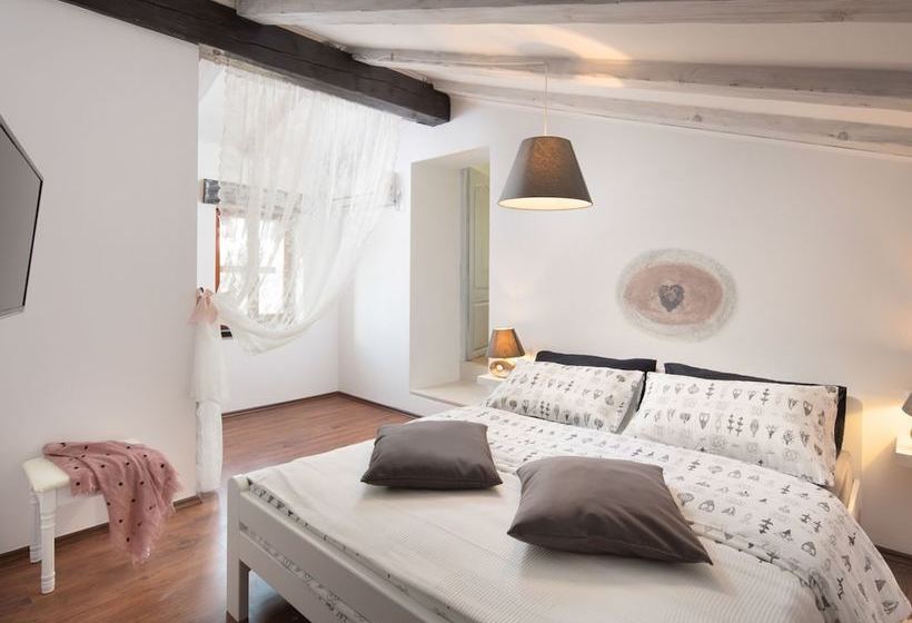 Surrounded By Beautiful Mediterranean Vegetation And The Crystal Clear Sea