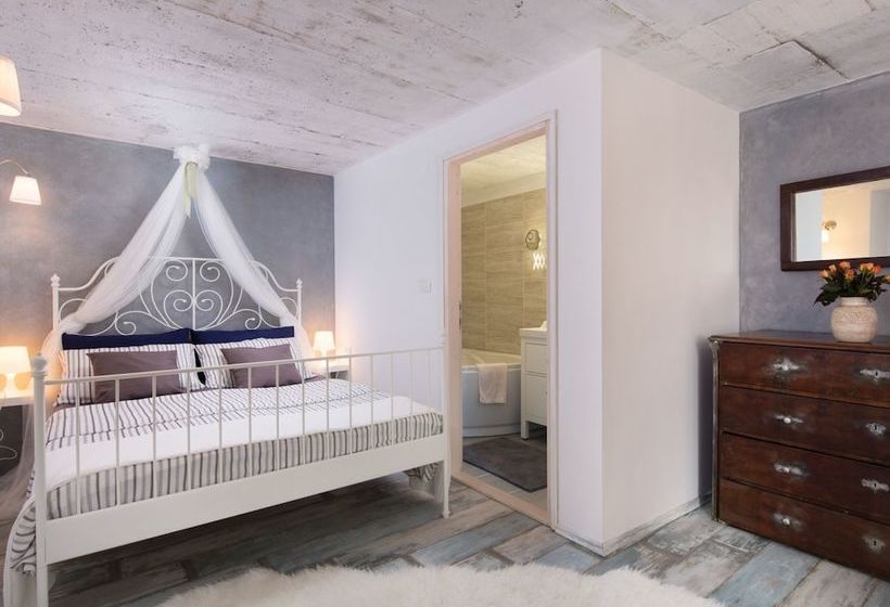 Surrounded By Beautiful Mediterranean Vegetation And The Crystal Clear Sea