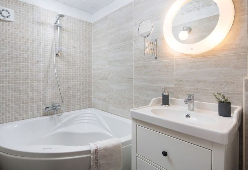 Surrounded By Beautiful Mediterranean Vegetation And The Crystal Clear Sea