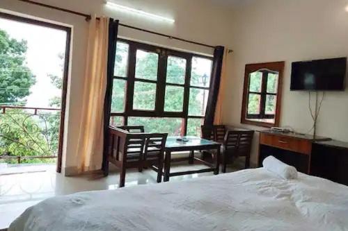 בית מלון כפרי Usha Palace