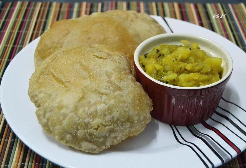 בית מלון כפרי Golden Nest Popular Residency