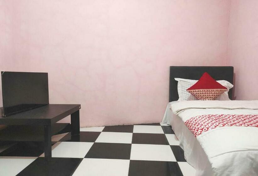 Отель Oyo 90323 Wisma Puspita Syariah