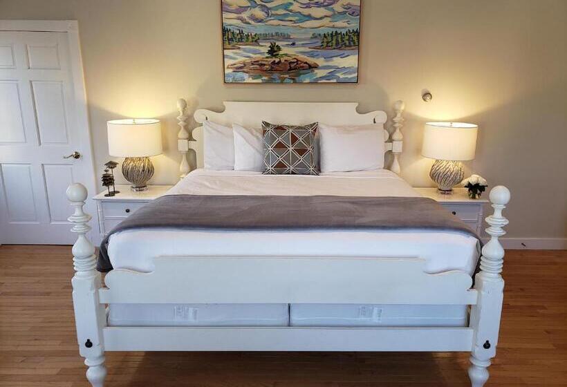 Отель Sand Bar Cottage Inn