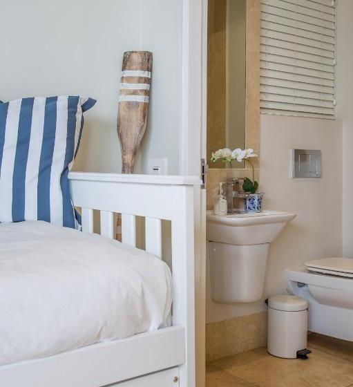 بنسيون Waves Of Grace Seafront Villa