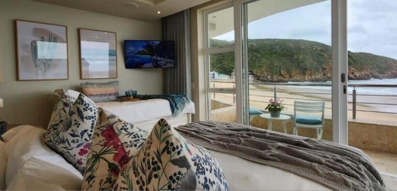 بنسيون Waves Of Grace Seafront Villa