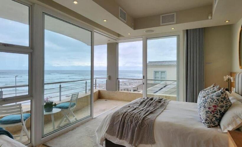 بنسيون Waves Of Grace Seafront Villa