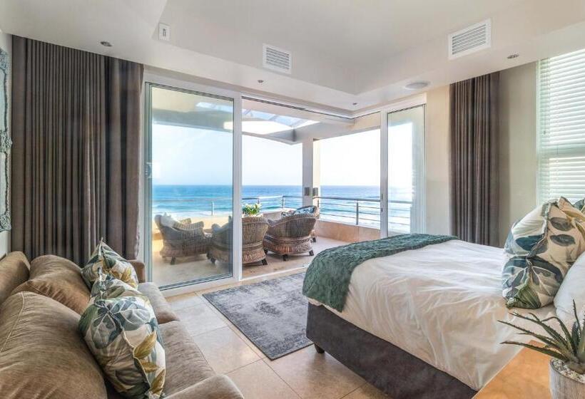 بنسيون Waves Of Grace Seafront Villa