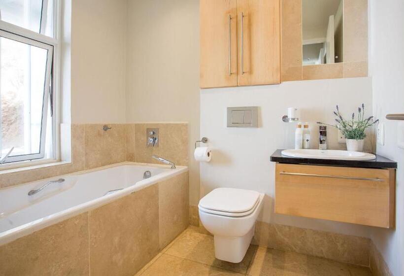 بنسيون Waves Of Grace Seafront Villa