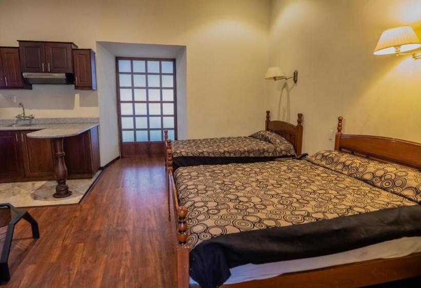 Suites & Hotel El Quijote