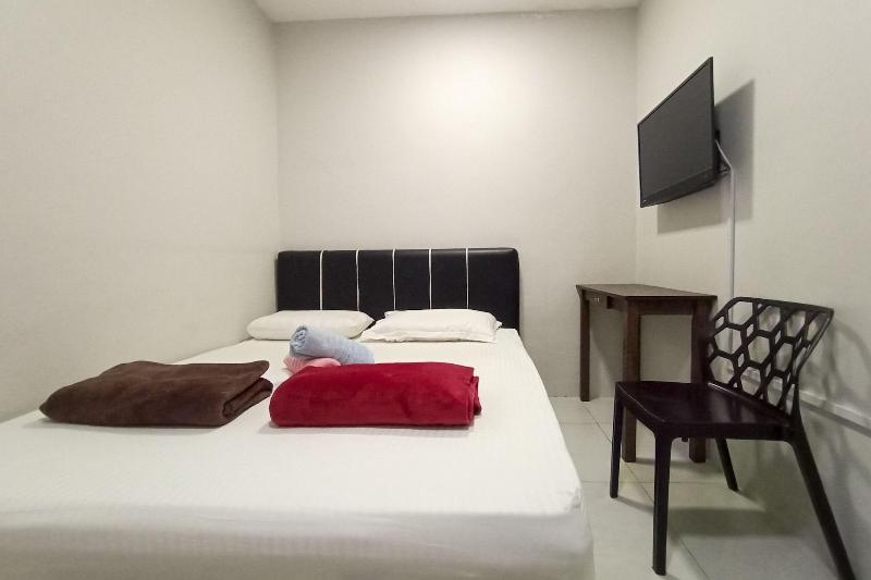 Отель Oyo 90261 Hom2rex Kuching Homestay