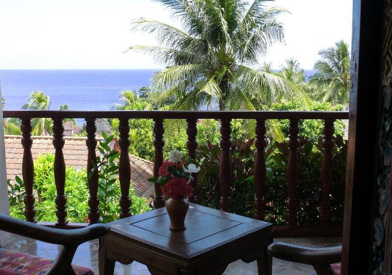 酒店 Puri Bunga Beach Cottages