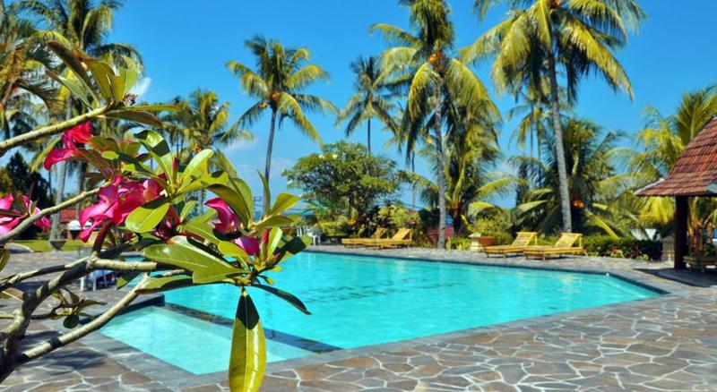 酒店 Puri Bunga Beach Cottages