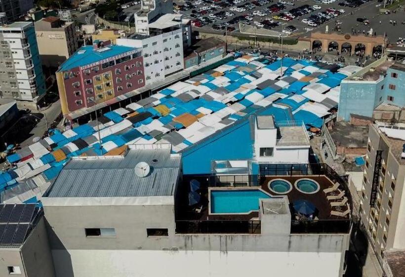 Отель Dos Devotos