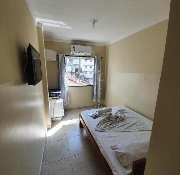 Отель Dos Devotos