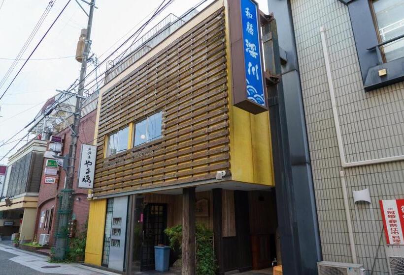 Общежитие ゲストハウス さんかくワサビ Guest House Sankaku Wasabi