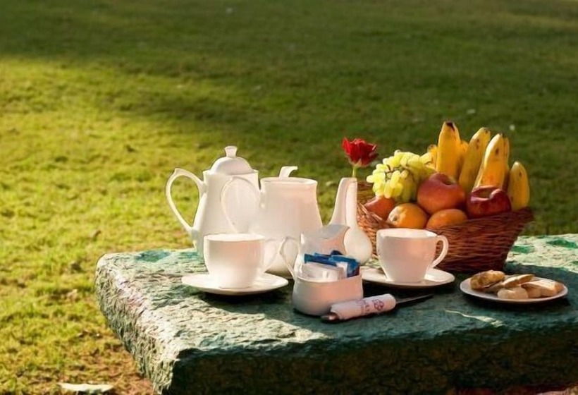 Отель Ramanashree California Resort