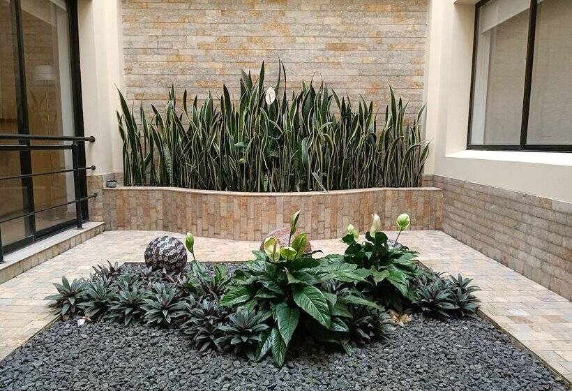 호텔 Boutique Confort Suites