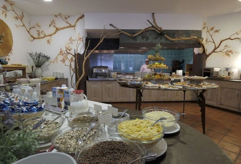 فندق Residence Baia Caddinas