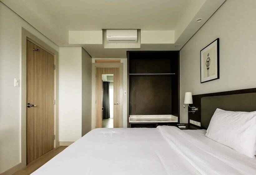 Отель Capital O 804 The Residences At Bonifacio Civic Center