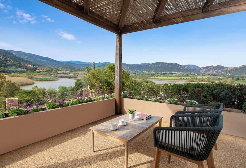 בית מלון כפרי Baia Di Chia Resort Sardinia, Curio Collection By Hilton