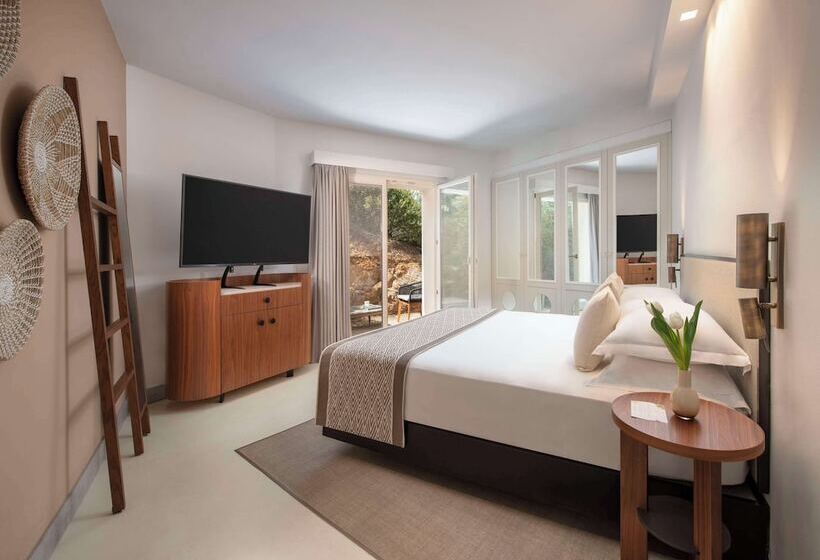 בית מלון כפרי Baia Di Chia Resort Sardinia, Curio Collection By Hilton