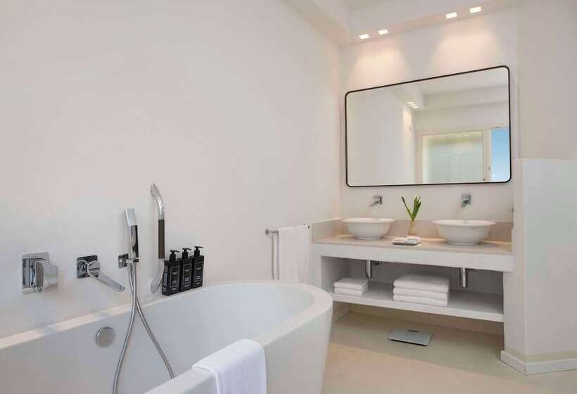 בית מלון כפרי Baia Di Chia Resort Sardinia, Curio Collection By Hilton