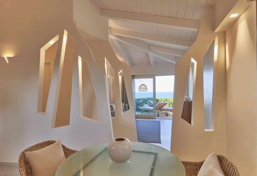 בית מלון כפרי Baia Di Chia Resort Sardinia, Curio Collection By Hilton