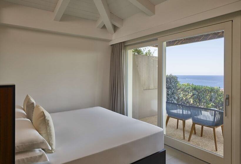 בית מלון כפרי Baia Di Chia Resort Sardinia, Curio Collection By Hilton