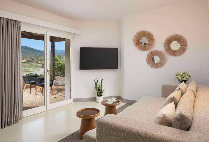 בית מלון כפרי Baia Di Chia Resort Sardinia, Curio Collection By Hilton