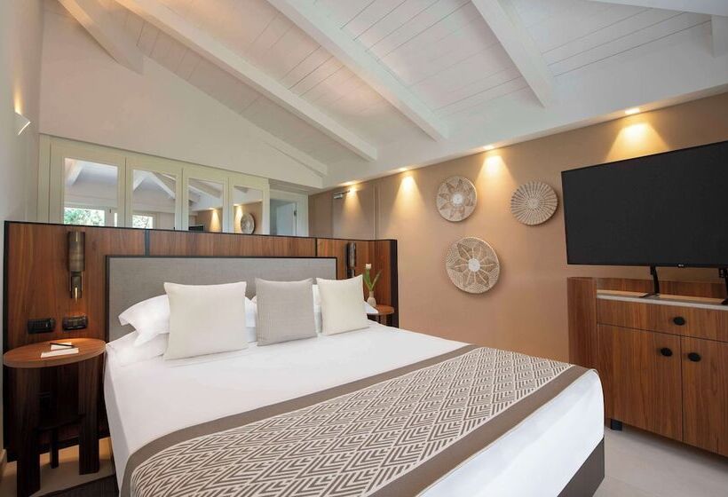 Отель Baia Di Chia Resort Sardinia, Curio Collection By Hilton