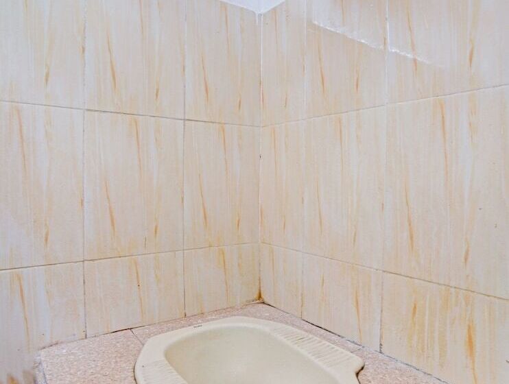 Отель Spot On 90586 Hagawa Syariah Homestay