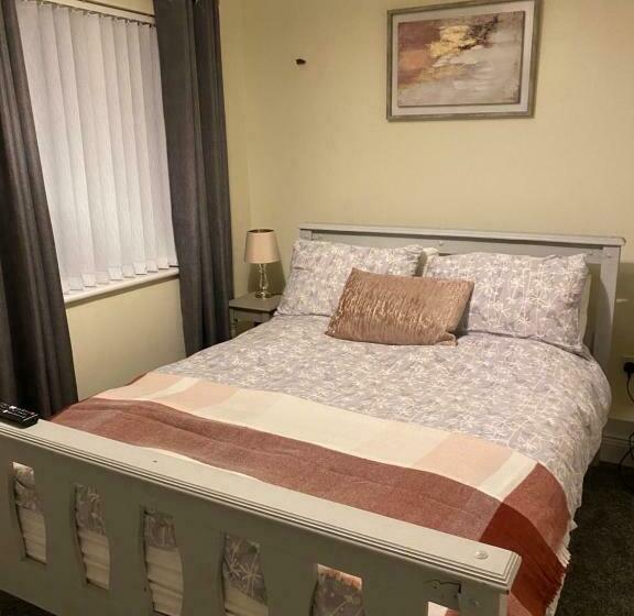 צימר The Strand Guest House