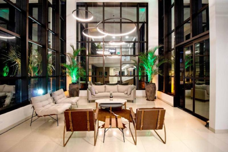 Отель Promenade Bonito All Suites