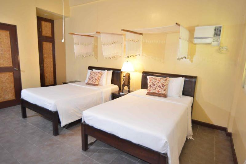 Nabulao Beach And Dive Resort