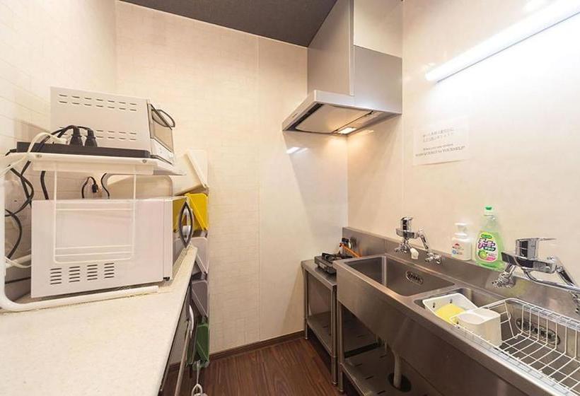 הוסטל Guesthouse Nibutani Yanto