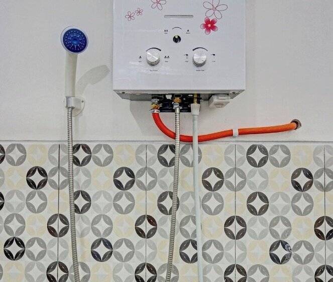 בית מלון כפרי Oyo 90517 Homestay Wonosobo Asri