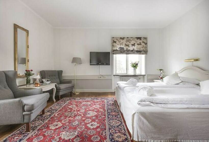 Отель Tidaholm Stadsl