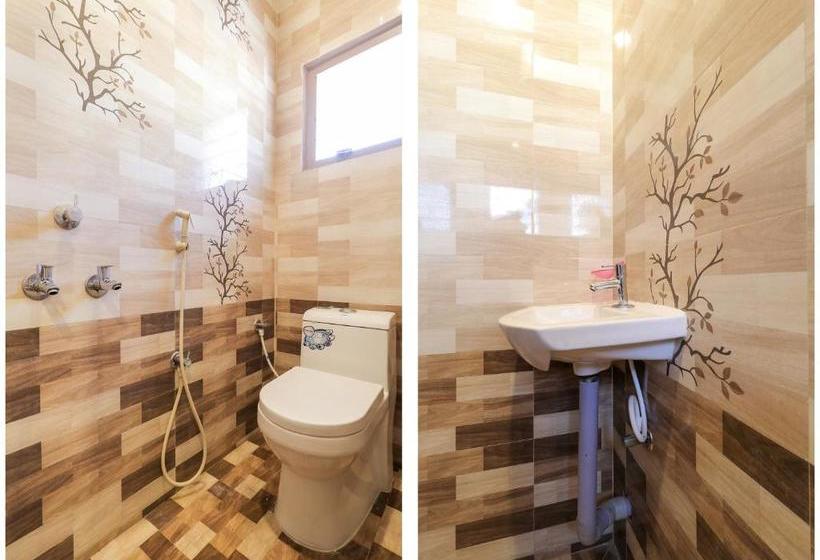 Отель Oyo 77439 Neomaxian Tower