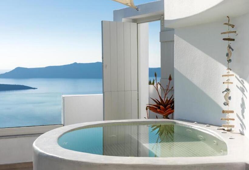 Отель Adamant Suites