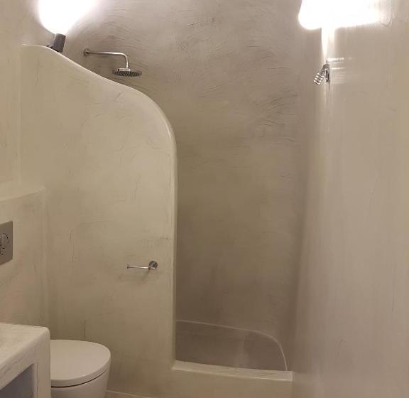 Отель Adamant Suites