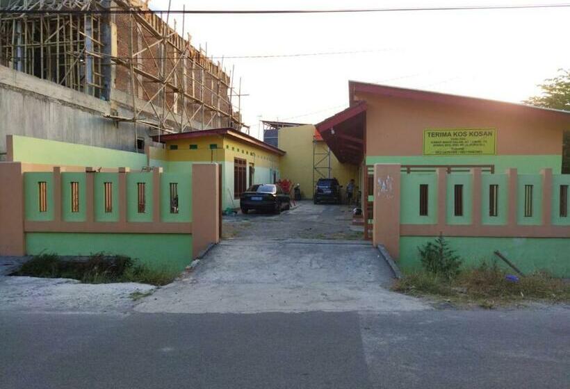 Отель Oyo 90648 Kusnan Guest House