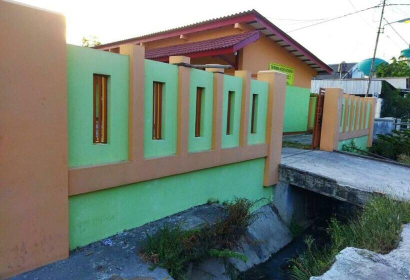 Отель Oyo 90648 Kusnan Guest House