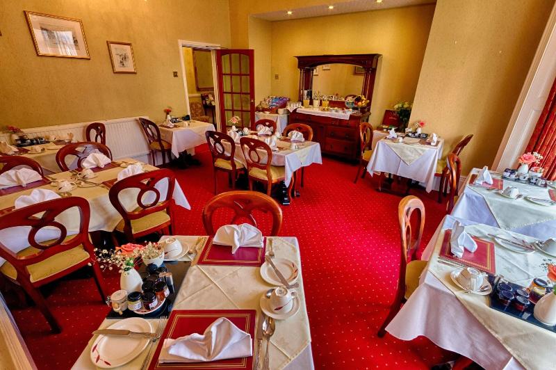 فندق Holcombe House Guest House