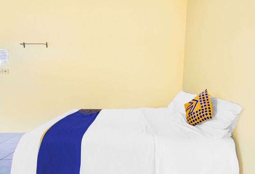 ホテル Spot On 90701 Kost Syariah Deris