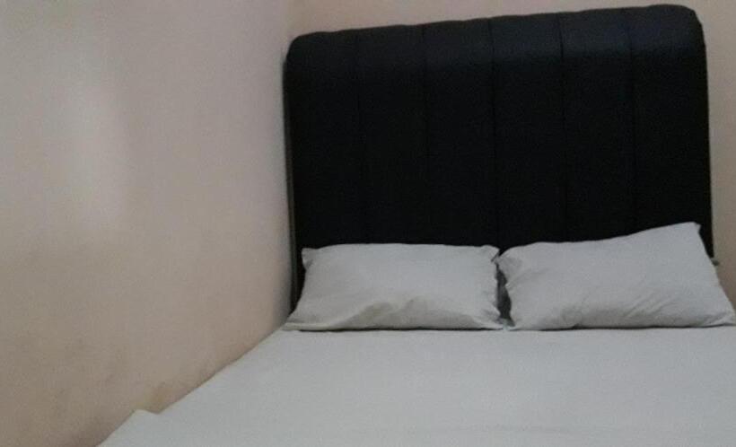 Отель Oyo 90706 Kost Alam Jaya Syariah