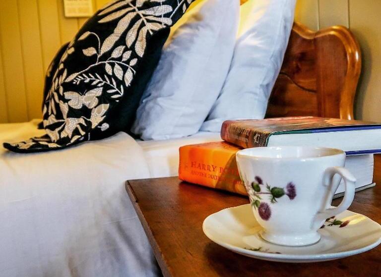 호스텔 Mountainaire Inn And Log Cabins