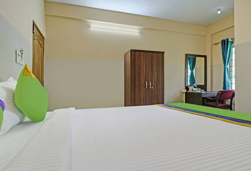 בית מלון כפרי Treebo Green Land Kushalnagar