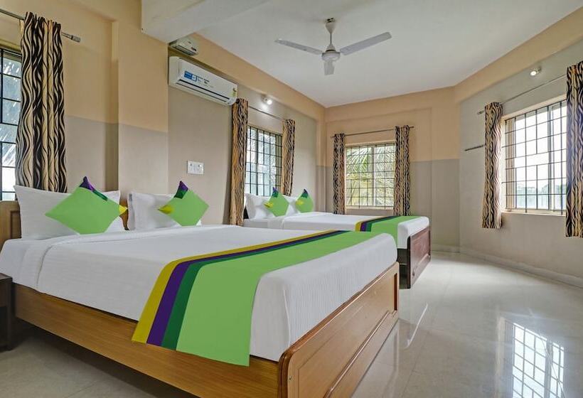 בית מלון כפרי Treebo Green Land Kushalnagar