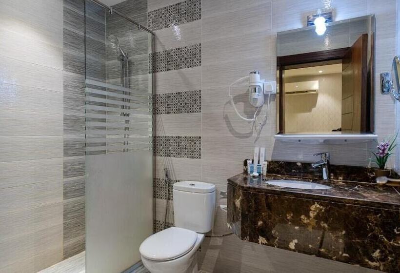 Отель Holiday Plus Al Nuzha