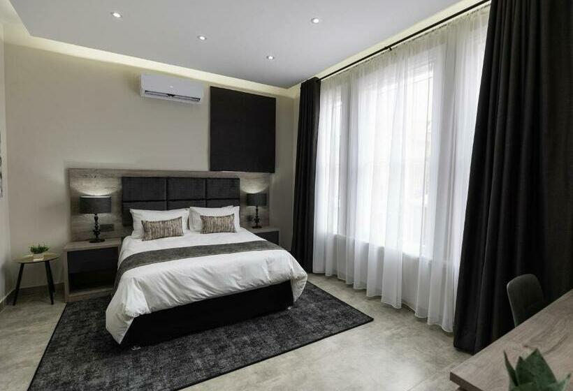 호텔 Luxe Suites Boutique